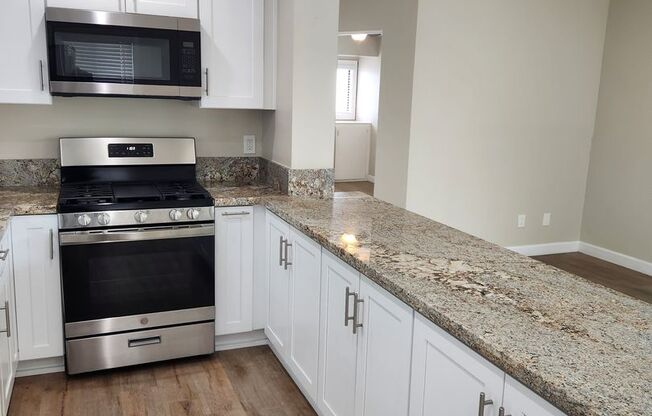 Upper Unit with Ocean View In OB - Complete Remodel