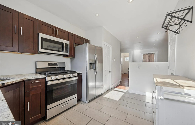 Modern 3-Bedroom Rowhome with Backyard Patio in Point Breeze — Accepting ALL PHA voucher holders