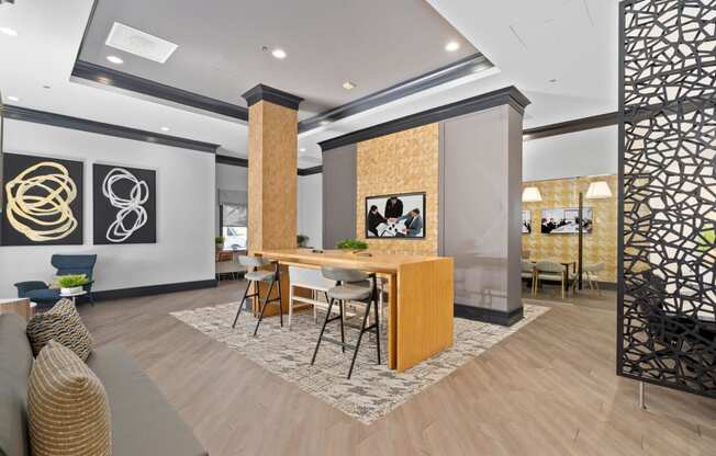 a dining room with a table and chairs in a lobby