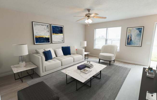 a living room with a white couch and a coffee table