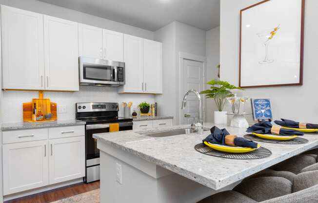 kitchen area of an apartment at ironridge at hill country village