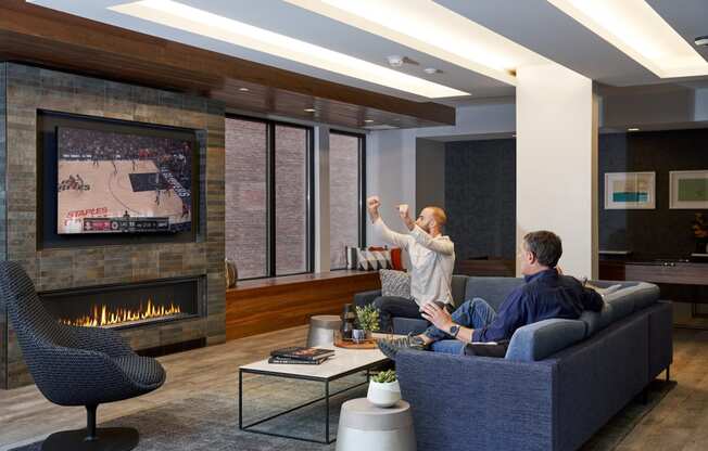 Resident club lounge with cozy fireplace at Nightingale, Providence, 02903,