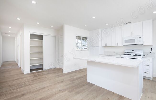 Spacious 4 Bedroom, 2 Bath Home with Private Yard and 2 Car Garage!