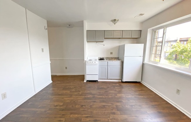 Kitchen with Hardwood Flooring at University Commons, Pennsylvania