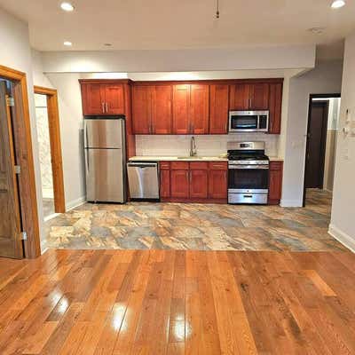 57 55 METROPOLITAN AVE