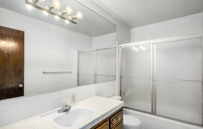 Bathroom With Vanity Lights at Barcelona Apartments, California