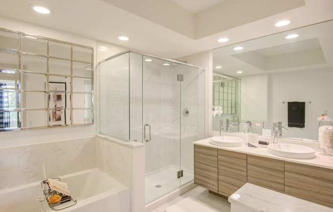 Spacious soaking tub and frameless glass enclosed shower in select master bathrooms at Windsor at Pembroke Gardens, Florida