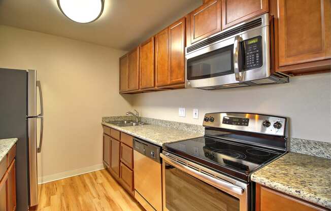 Kitchen gallery with appliances at Madison Place, San Mateo, CA