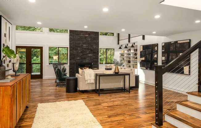 Welcome to your Private Luxury Sanctuary that Sits on 1.66 Serene Acres Complete with ADU and Private Walking Trails!
