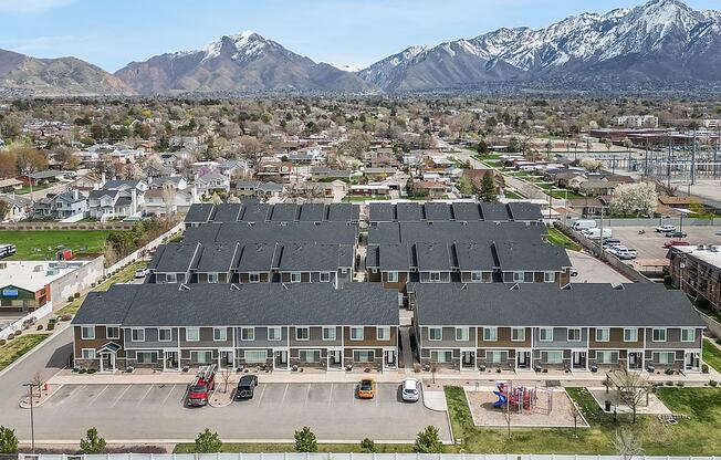 A large building with a parking lot in front of it.