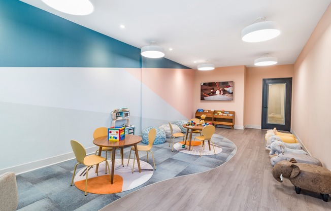 At Modera Montville, our vibrant kids' playroom offers a fun space for little ones to explore and enjoy, fostering creativity and making every day an adventure!