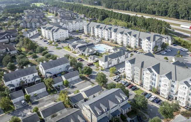 an aerial view of apartment buildings in a neighborhood