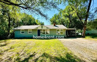 Ranch Style Home in KCMO w/ LVP Floors, SS Appliances and a Fenced Yard!