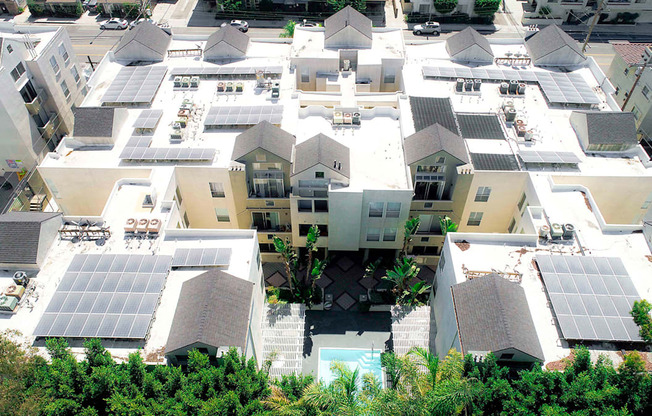 Aerial drone image of Palms Court Apartments.