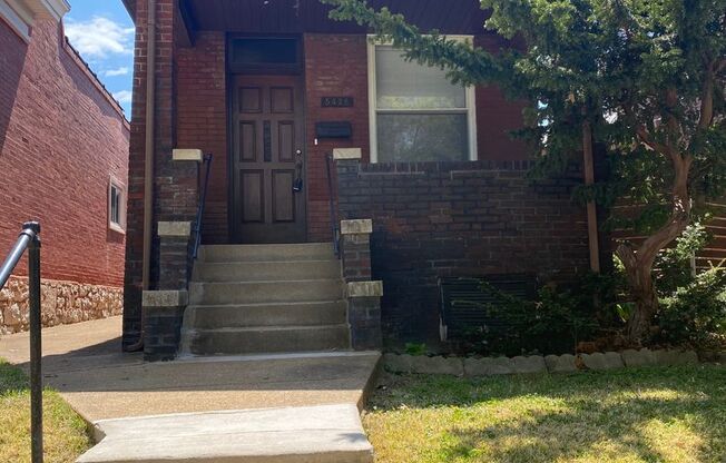 Updated Home in The Hill with garage!