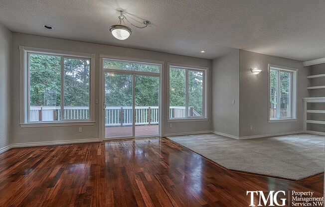 Beautiful 4br/2.5ba home with 3 car garage, deck, AC and more!