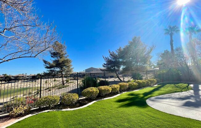 A gorgeous two story home with a grand entryway and a beautiful golf course view from the backyard within the Rhodes Ranch gated community.