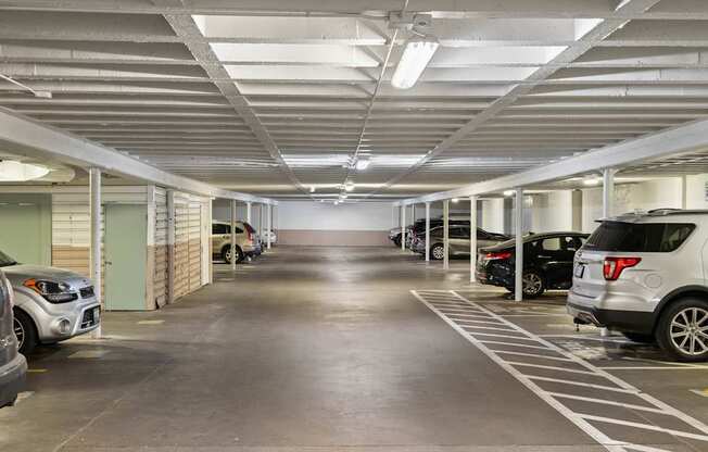 a parking garage with cars parked in it