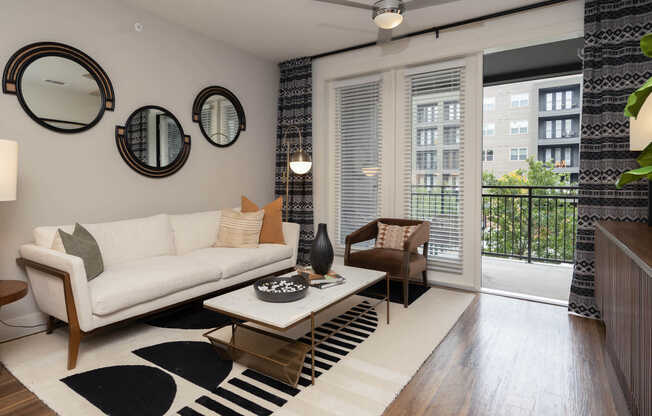 Living Room with Balcony and Hard Surface Flooring