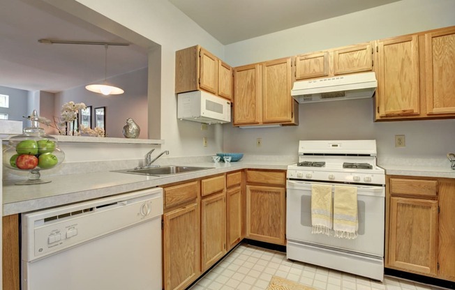 Kitchens equipped with modern appliances and breakfast bar