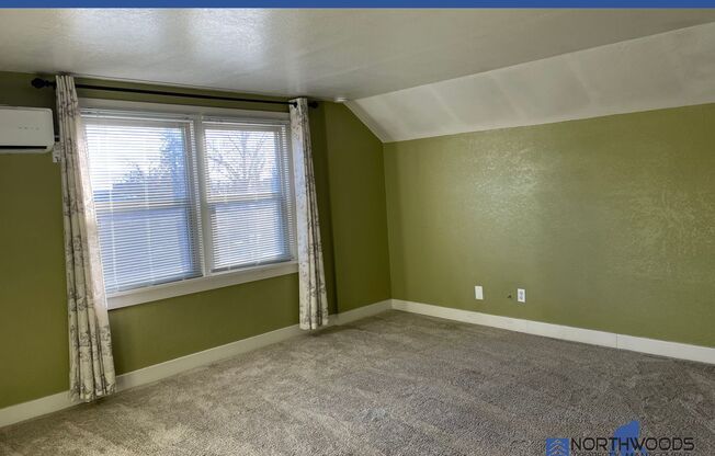 Very Cute 1 bed 1 bath upstairs unit, with separate living room, gated parking with extra storage area