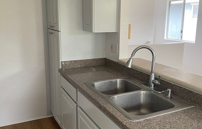 Updated 3 Bedroom, 2 Bath Pet Friendly Home with a Garage, Yard, and Central AC