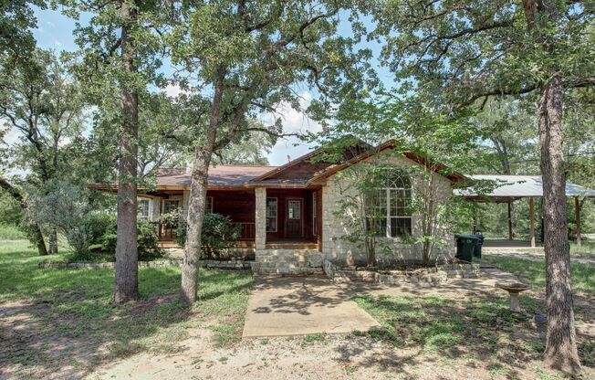 Available for August Move in! Acreage with a stocked pond, all in the heart of South College Station!