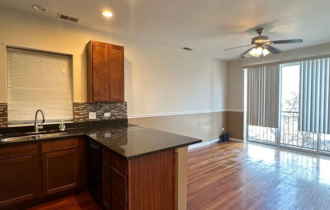 7654 S. Colfax Ave.