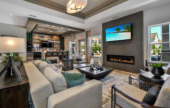 a living room with a couch and a fireplace