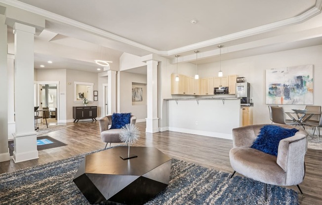 Clubhouse seating and kitchen area at The Madison apartments in Olympia, WA