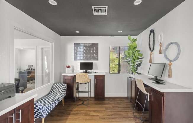 a home office with a desk and a chair