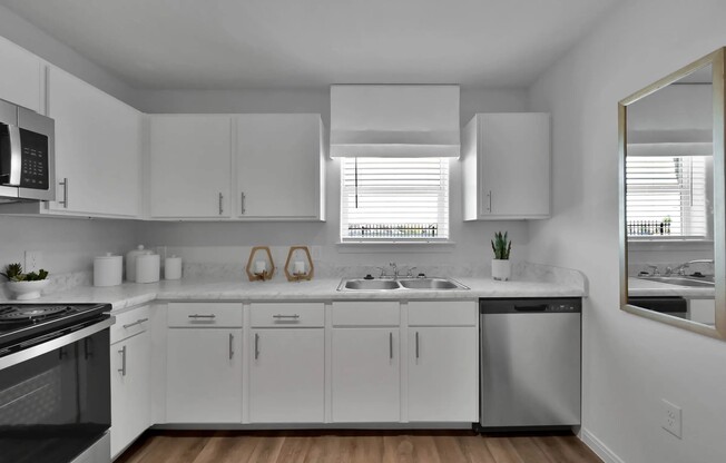 Enjoy the modern elegance of the spacious kitchen at Esperanza at Wild Orchid. With sleek countertops, ample storage, and state-of-the-art appliances, it's perfect for culinary enthusiasts. Schedule your tour today and elevate your living!