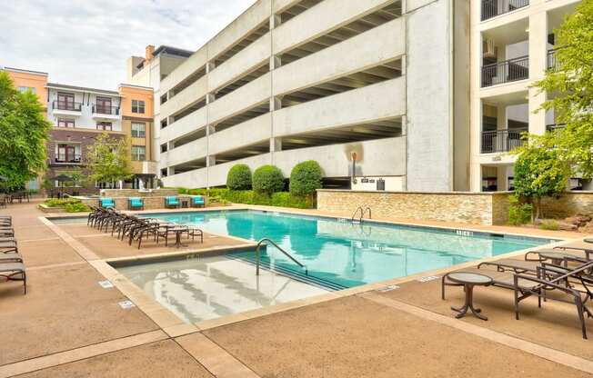 our apartments have a large pool and lounge chairs