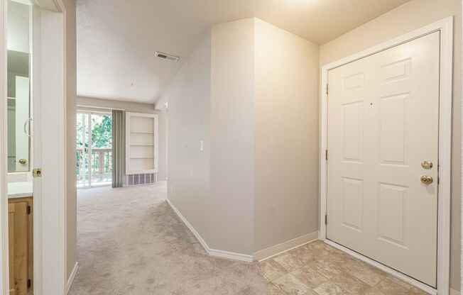 Modern 2-Bed/2-Bath Condo in Gated One Lake Place – Attached Garage