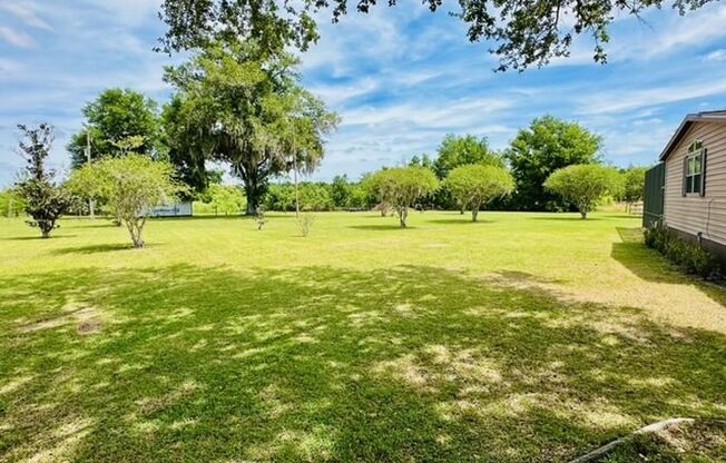 3/2 with POOL, newly renovated, AND on 2.5 acres in Groveland! Available NOW!