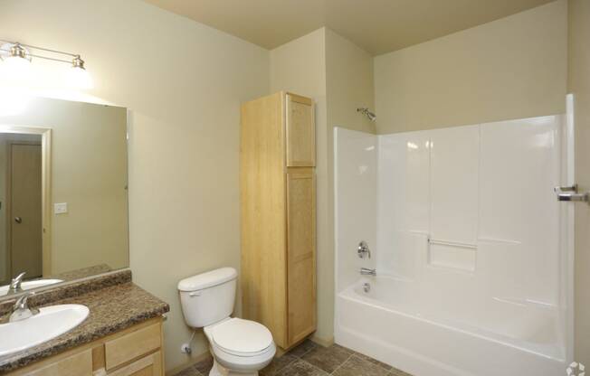 Bathroom with vanity at Stonebridge Villas Apartments, North Dakota