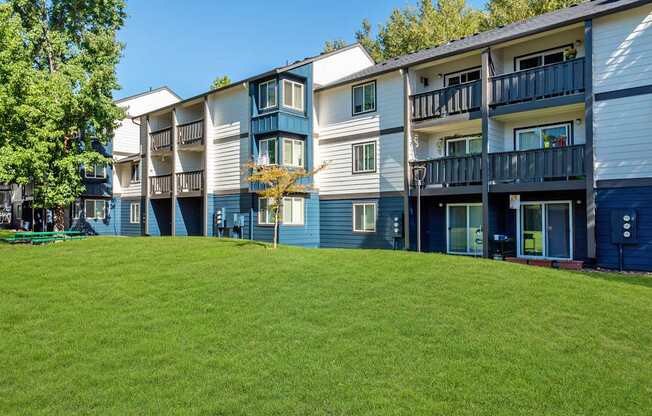 Crown Court three story building exterior and green space