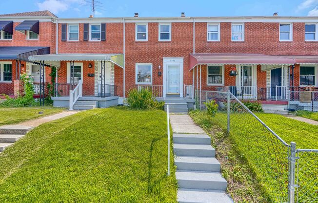 3 Bed 1 Bath Rowhome with OFFSTREET PARKING AND OUTSIDE STORAGE