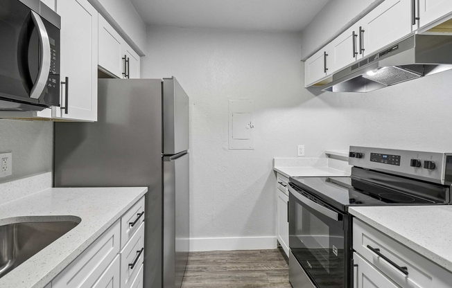 Granite counter tops, new cabinets, and stainless appliances!