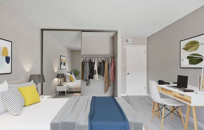 a bedroom with a bed and a desk and a closet