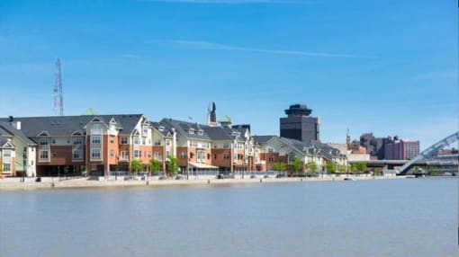 View of COrn Hill Landing from across the Genesee River looking towards the north and downtown