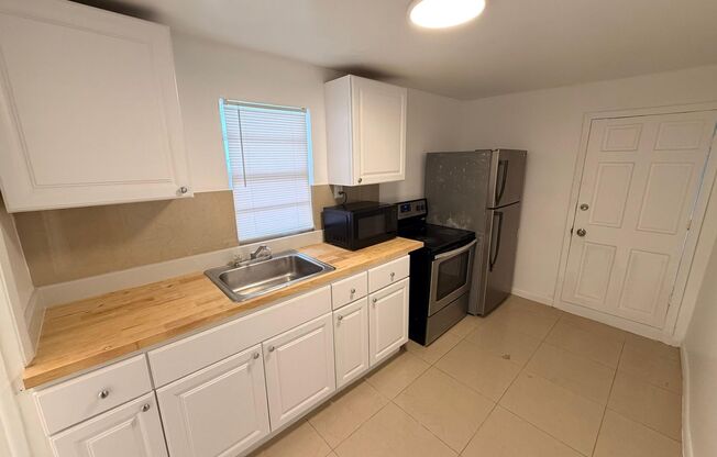 548 NW 30 ST