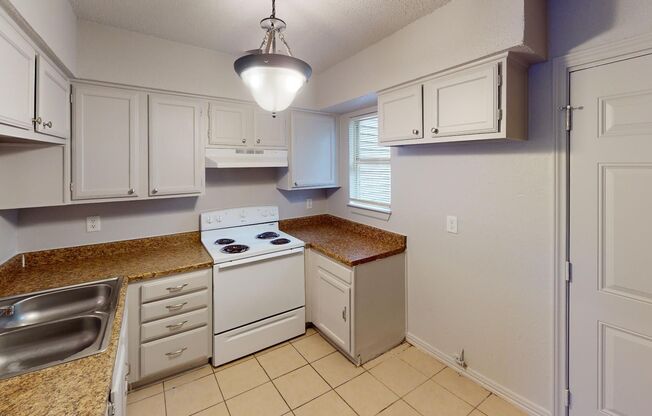 2 story townhome with private fenced yard!