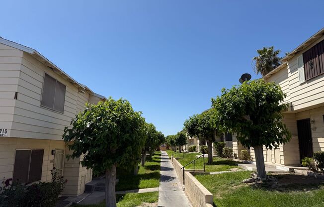 3 Bedroom Townhouse with a 2 car garage and a middle courtyard area