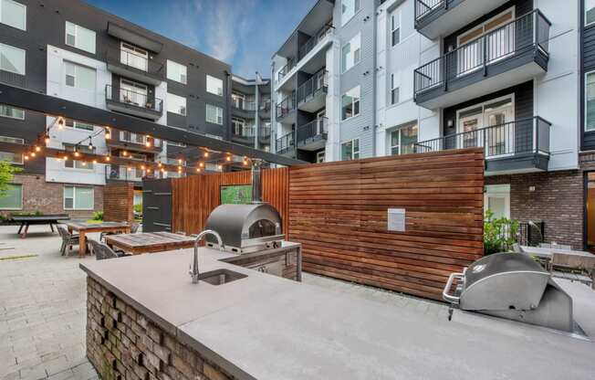 Outdoor courtyard with grills | Glenn Perimeter