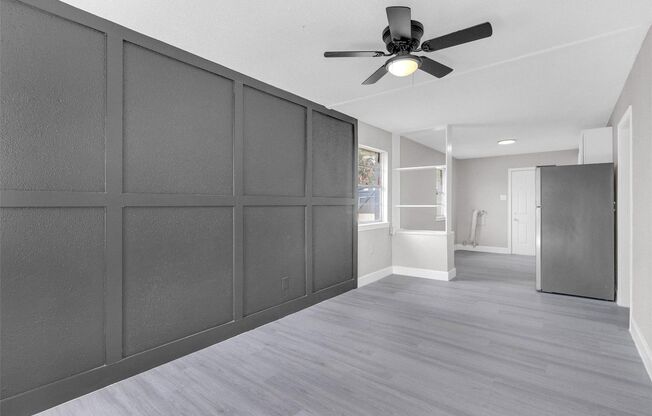 This beautifully remodeled duplex offers modern comfort and style with its two spacious bedrooms and one sleek bathroom. The updated interior features fresh paint, contemporary fixtures, and elegant flooring that complements the open floor plan. The kitch