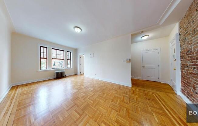 201 205 W 11 ST