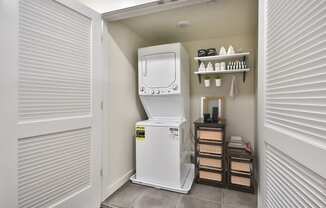 the laundry room has a washer and dryer in it