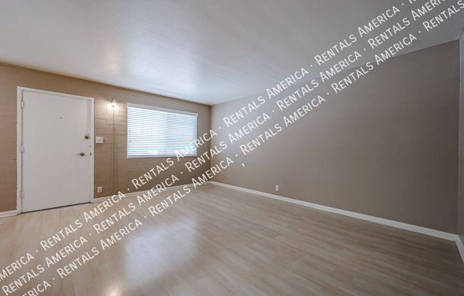 6841 E 2 ST