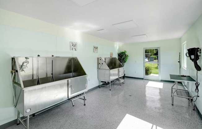 a large room with two large stainless steel refrigerators in it at The Park Apartments, Rancho Cucamonga,California, 91730